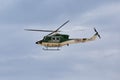 Helicopter of italian military force Carabinieri patrols Rome`s street from the sky on a cloudy day