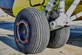 Helicopter landing gear with aircraft thrust pad. Landing gear of military helicopter. Wheel Of Airplane Or Helicopter Royalty Free Stock Photo