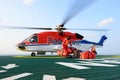 The helicopter landing officer loading baggage to helicopter at Royalty Free Stock Photo