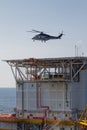 Helicopter landing on an offshore oil-plant