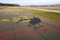 Helicopter landing shadow Royalty Free Stock Photo
