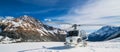 Helicopter Landing on a Snow Mountain Royalty Free Stock Photo