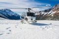 Helicopter Landing on a Snow Mountain Royalty Free Stock Photo