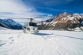 Helicopter Landing on a Snow Mountain Royalty Free Stock Photo