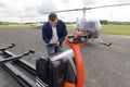 helicopter mechanic controlling helicopter