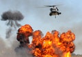 Helicopter over fire Royalty Free Stock Photo