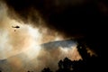 Helicopter over forest fire Royalty Free Stock Photo