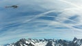 Helicopter over mountain peaks