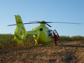 Helicopter parked on a field