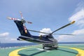 Helicopter parking landing on offshore platform. Helicopter transfer crews or passenger to work in offshore oil and gas industry Royalty Free Stock Photo