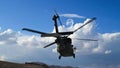 Helicopter starting from military base Royalty Free Stock Photo