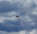 Helicopter in the stormy sky Royalty Free Stock Photo
