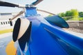 Helicopter tail rotor selective focus or Tail rotor of transport helicopter under hangar background. Royalty Free Stock Photo