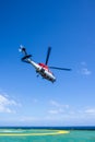 Helicopter take off from oil rig Royalty Free Stock Photo