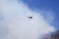 Helicopter trying to extinguish a mountain fire