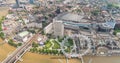 Helicopter view of London along Thames river with Waterloo train