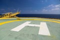 Helideck of oil and gas drilling rig in offshore industry, Helicopter landing area on construction platform in offshore Royalty Free Stock Photo