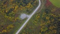 Helipad area for parking on forest near road. Clip. Top view on helipad in a wooded area