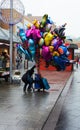 Helium balloon seller on high street