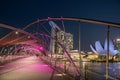 Helix bridge light up with Art museum and Marina Bay Sands