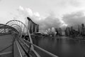 Helix bridge and the Singapore Marina Bay Signature Skyline in black and white photo