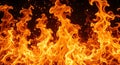 Fiery Orange Flames Against a Dark Background by AI Generated Royalty Free Stock Photo