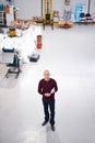 Hell be asking you a few questions. Portrait of a factory manager standing with a clipboard.