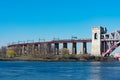 The Hell Gate Bridge over the East River with an Amtrak Acela Train