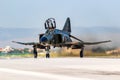 Hellenic Air Force RF-4E Phantom II reconnaissance jet plane taxiing at Larissa Air Base. Greece - May 4, 2017