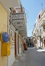 Hellenic Post Yellow Mail Box and Pyrgi Homes with Decorative Motifs at Pyrgi Village in Chios, Greece