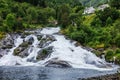 Hellesyltfossen waterfall in the area Geirangerfjord