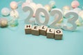 Hello 2023 alphabet letters with space copy on blue background