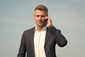 Hello, answer the phone. Businessman call on mobile phone. Handsome man with cell phone outdoors. Business communication