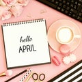 Hello April text on notebook