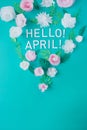 Hello, April. With white and rose paper flowers Royalty Free Stock Photo