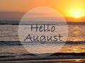 Hello August greeting on ocean sunset background.Summer concept. Royalty Free Stock Photo