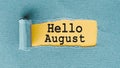 Hello August text on torn paper