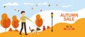 Hello autumn, sale banner, autumn park, man walking the dog in the autumn park