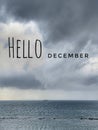 hello december with heavy dark clouds on the beach background. Royalty Free Stock Photo