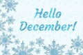 Hello December message with blue snowflake frame Royalty Free Stock Photo