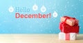 Hello December message with Christmas gift boxes Royalty Free Stock Photo