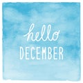 Hello December text with blue watercolor background Royalty Free Stock Photo