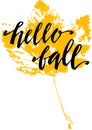 Hello fall, hand written lettering on silhouette of print of maple leaf