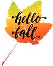 Hello fall, hand written lettering on silhouette of print of maple leaf