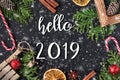 HELLO 2019 handwritten inscription. Winter holiday composition. Top View. Royalty Free Stock Photo