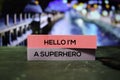 Hello I`m A Superhero on the sticky notes with bokeh background