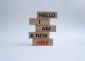 Hello I am a new hire symbol. Concept words Hello I am a new hire on wooden blocks. Beautiful white background. Business and Hello Royalty Free Stock Photo