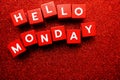 Hello Monday alphabet letter on red glitter background Royalty Free Stock Photo