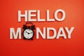 Hello Monday alphabet letters on red background Royalty Free Stock Photo