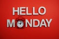 Hello Monday alphabet letters on red background Royalty Free Stock Photo
